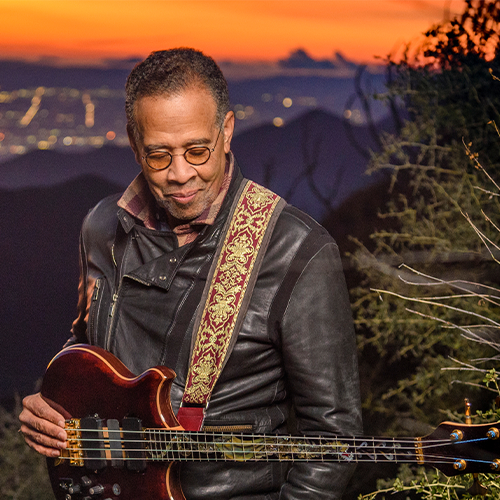 Stanley Clarke holding a bass